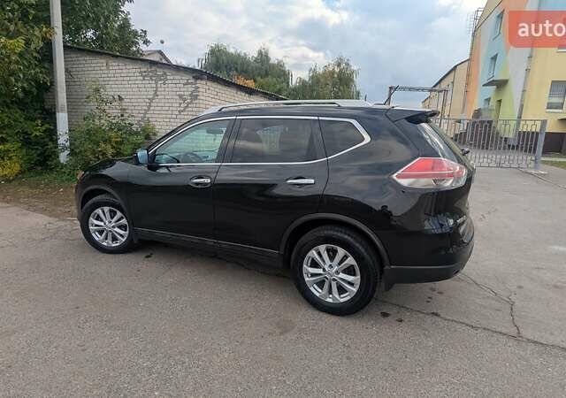 Черный Ниссан Rogue, объемом двигателя 2.49 л и пробегом 143 тыс. км за 15000 $, фото 5 на Automoto.ua