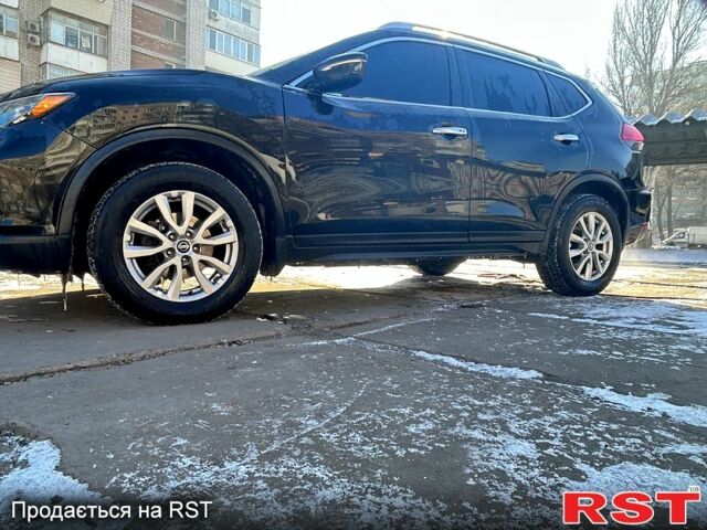 Черный Ниссан Rogue, объемом двигателя 2.5 л и пробегом 147 тыс. км за 12700 $, фото 1 на Automoto.ua