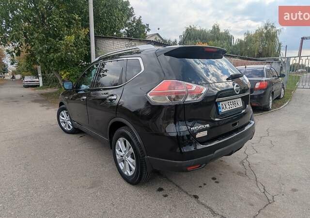 Черный Ниссан Rogue, объемом двигателя 2.49 л и пробегом 143 тыс. км за 15000 $, фото 4 на Automoto.ua