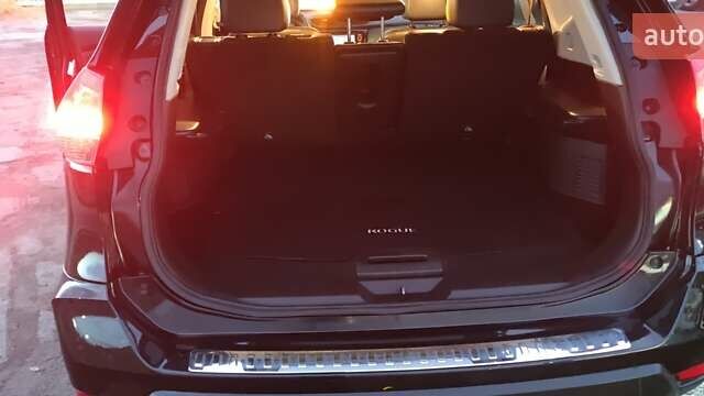 Черный Ниссан Rogue, объемом двигателя 2.49 л и пробегом 144 тыс. км за 16000 $, фото 2 на Automoto.ua