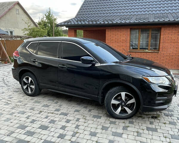 Черный Ниссан Rogue, объемом двигателя 2.5 л и пробегом 157 тыс. км за 14000 $, фото 3 на Automoto.ua
