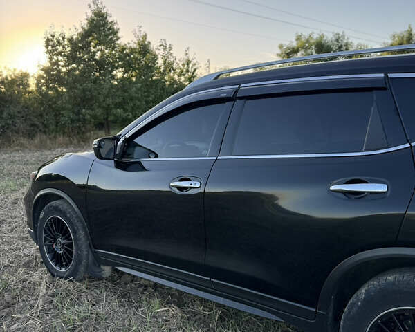 Черный Ниссан Rogue, объемом двигателя 2.5 л и пробегом 150 тыс. км за 16000 $, фото 12 на Automoto.ua