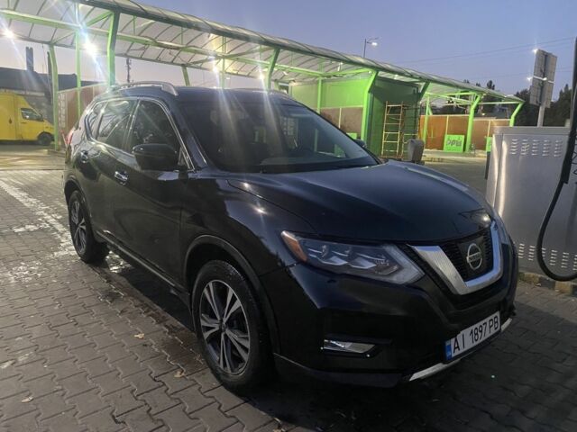 Черный Ниссан Rogue, объемом двигателя 2.5 л и пробегом 144 тыс. км за 17000 $, фото 1 на Automoto.ua