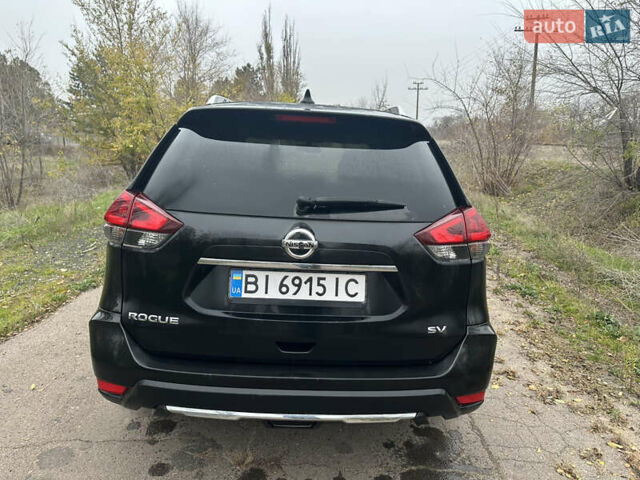Черный Ниссан Rogue, объемом двигателя 2.49 л и пробегом 148 тыс. км за 14000 $, фото 27 на Automoto.ua