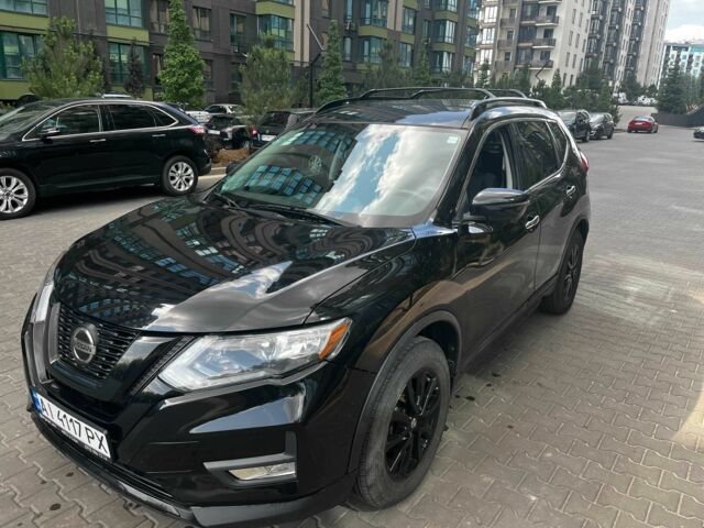 Черный Ниссан Rogue, объемом двигателя 2.5 л и пробегом 128 тыс. км за 14600 $, фото 1 на Automoto.ua