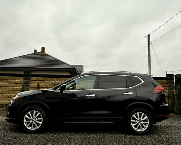 Черный Ниссан Rogue, объемом двигателя 2.5 л и пробегом 147 тыс. км за 15100 $, фото 2 на Automoto.ua