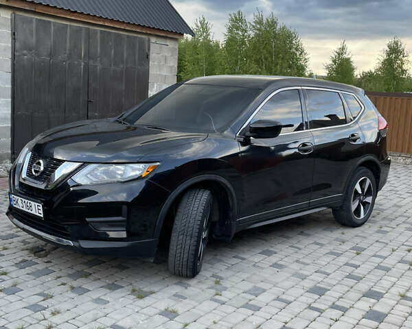 Черный Ниссан Rogue, объемом двигателя 2.5 л и пробегом 157 тыс. км за 14000 $, фото 1 на Automoto.ua
