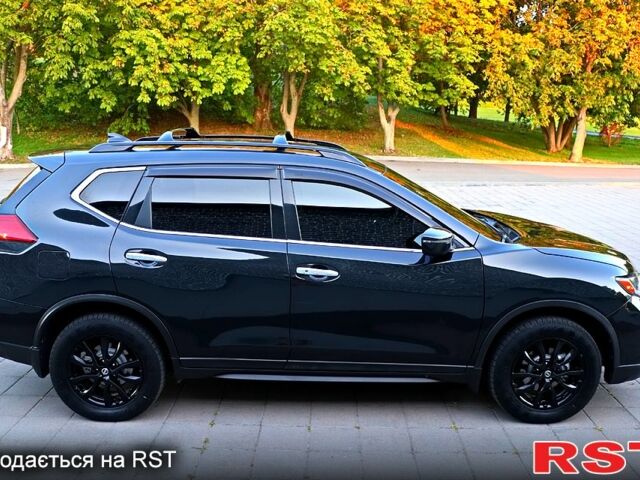 Черный Ниссан Rogue, объемом двигателя 2.5 л и пробегом 157 тыс. км за 15555 $, фото 2 на Automoto.ua