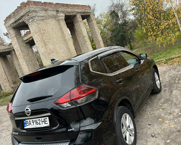 Черный Ниссан Rogue, объемом двигателя 2.49 л и пробегом 166 тыс. км за 15500 $, фото 3 на Automoto.ua