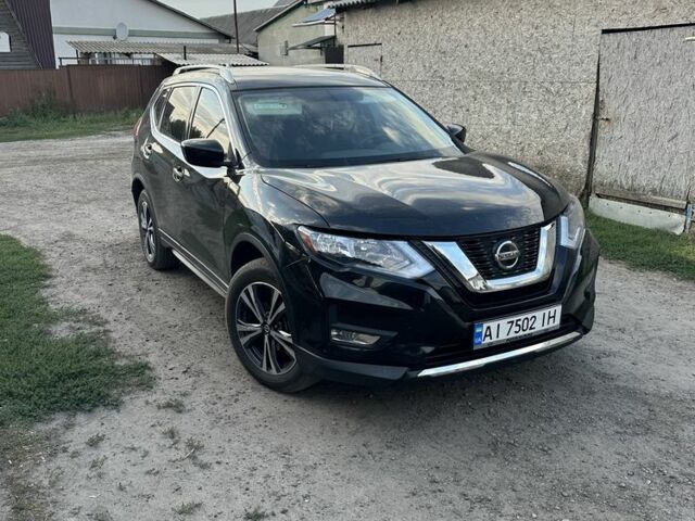Черный Ниссан Rogue, объемом двигателя 2.5 л и пробегом 60 тыс. км за 15200 $, фото 2 на Automoto.ua