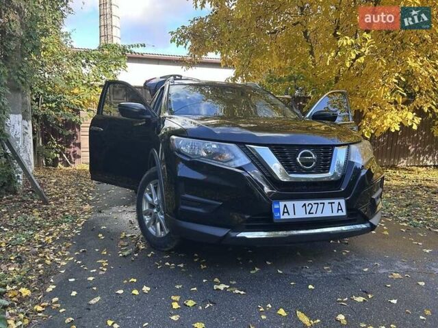 Черный Ниссан Rogue, объемом двигателя 2.5 л и пробегом 165 тыс. км за 18000 $, фото 23 на Automoto.ua