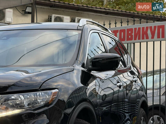 Черный Ниссан Rogue, объемом двигателя 2.49 л и пробегом 143 тыс. км за 17499 $, фото 4 на Automoto.ua