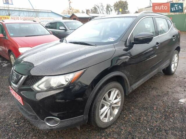 Черный Ниссан Rogue, объемом двигателя 2 л и пробегом 150 тыс. км за 12500 $, фото 1 на Automoto.ua