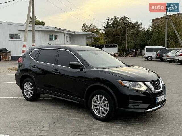 Черный Ниссан Rogue, объемом двигателя 2.49 л и пробегом 129 тыс. км за 13700 $, фото 2 на Automoto.ua