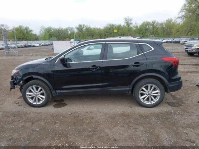 Черный Ниссан Rogue, объемом двигателя 2 л и пробегом 100 тыс. км за 13899 $, фото 3 на Automoto.ua