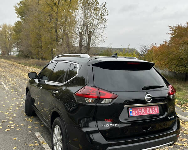 Черный Ниссан Rogue, объемом двигателя 2.49 л и пробегом 58 тыс. км за 16000 $, фото 3 на Automoto.ua