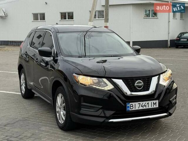 Черный Ниссан Rogue, объемом двигателя 2.49 л и пробегом 129 тыс. км за 13700 $, фото 62 на Automoto.ua