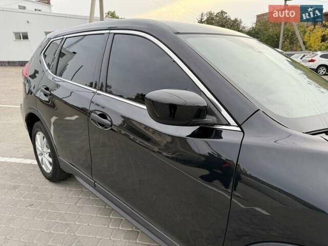 Черный Ниссан Rogue, объемом двигателя 2.49 л и пробегом 129 тыс. км за 13700 $, фото 20 на Automoto.ua