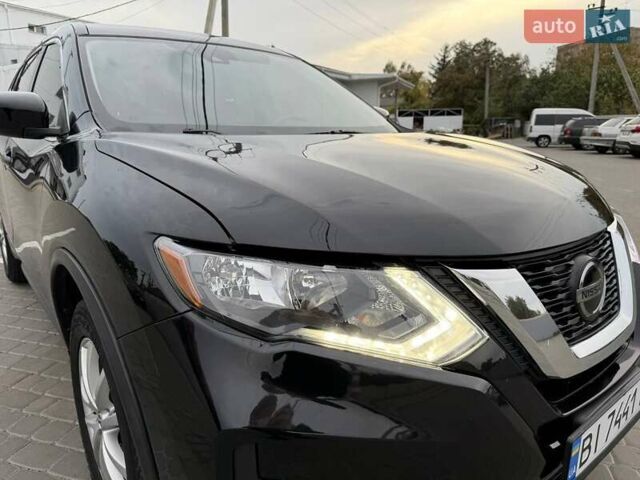 Черный Ниссан Rogue, объемом двигателя 2.49 л и пробегом 129 тыс. км за 13700 $, фото 23 на Automoto.ua