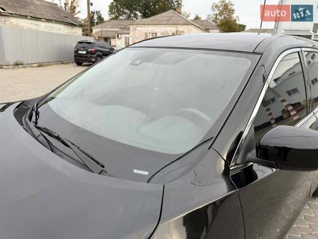 Черный Ниссан Rogue, объемом двигателя 2.49 л и пробегом 129 тыс. км за 13700 $, фото 13 на Automoto.ua