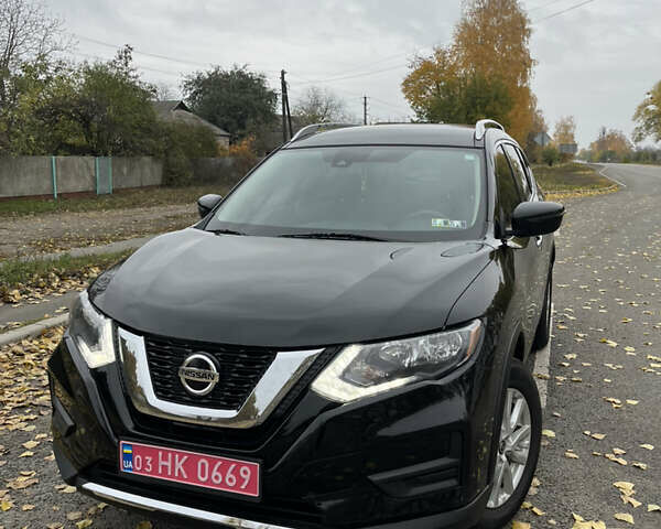 Черный Ниссан Rogue, объемом двигателя 2.49 л и пробегом 58 тыс. км за 16000 $, фото 1 на Automoto.ua