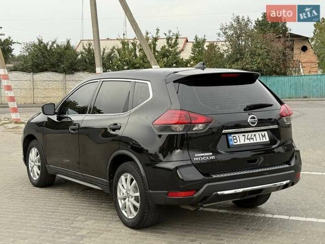 Черный Ниссан Rogue, объемом двигателя 2.49 л и пробегом 129 тыс. км за 13700 $, фото 6 на Automoto.ua