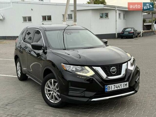 Черный Ниссан Rogue, объемом двигателя 2.49 л и пробегом 129 тыс. км за 13700 $, фото 4 на Automoto.ua