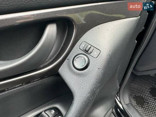 Черный Ниссан Rogue, объемом двигателя 2.49 л и пробегом 109 тыс. км за 16490 $, фото 8 на Automoto.ua