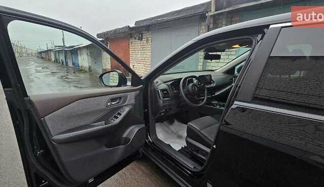 Чорний Ніссан Rogue, об'ємом двигуна 1.5 л та пробігом 90 тис. км за 20800 $, фото 11 на Automoto.ua