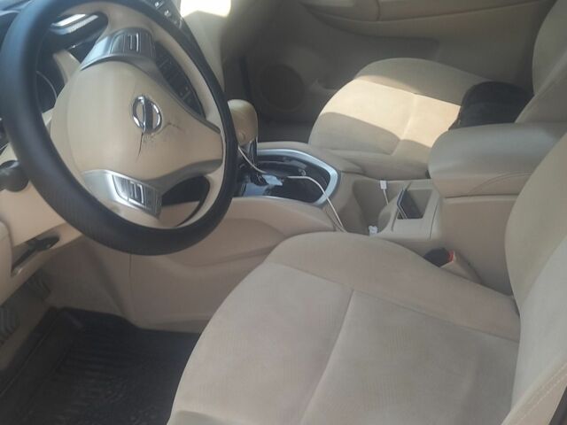 Красный Ниссан Rogue, объемом двигателя 2.5 л и пробегом 260 тыс. км за 10700 $, фото 1 на Automoto.ua