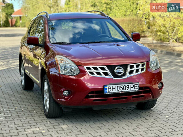 Красный Ниссан Rogue, объемом двигателя 2.49 л и пробегом 210 тыс. км за 9500 $, фото 3 на Automoto.ua