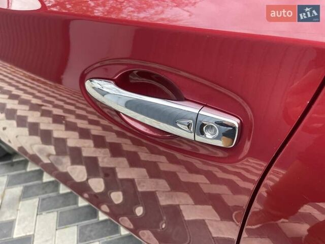 Красный Ниссан Rogue, объемом двигателя 2.49 л и пробегом 198 тыс. км за 12200 $, фото 6 на Automoto.ua