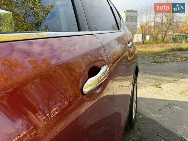 Ниссан Rogue 2014 в Киеве на Automoto.ua Красный Ниссан Rogue, объемом двигателя 2.49 л и пробегом 126 тыс. км за 12300 $, фото 5 на Automoto.ua