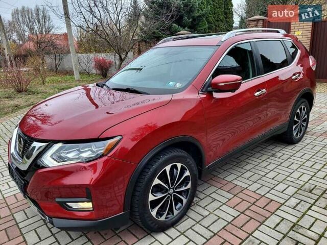 Красный Ниссан Rogue, объемом двигателя 2.49 л и пробегом 127 тыс. км за 13900 $, фото 4 на Automoto.ua