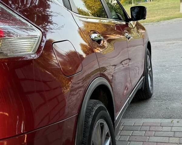 Красный Ниссан Rogue, объемом двигателя 2.49 л и пробегом 125 тыс. км за 14750 $, фото 2 на Automoto.ua