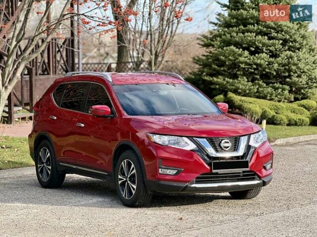 Красный Ниссан Rogue, объемом двигателя 2.5 л и пробегом 170 тыс. км за 13999 $, фото 3 на Automoto.ua