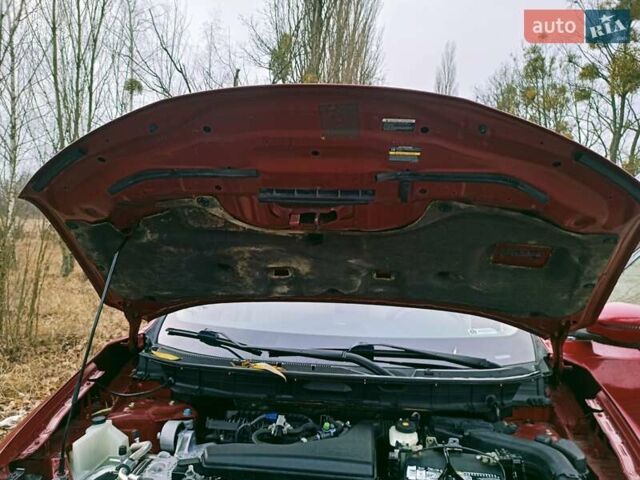 Червоний Ніссан Rogue, об'ємом двигуна 2.49 л та пробігом 160 тис. км за 13999 $, фото 59 на Automoto.ua