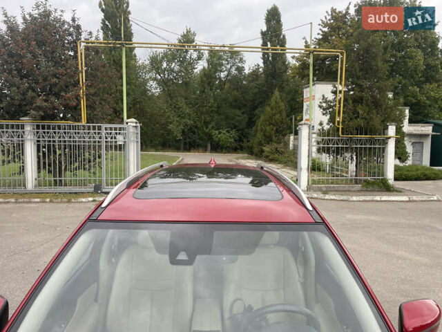 Красный Ниссан Rogue, объемом двигателя 2.5 л и пробегом 147 тыс. км за 16000 $, фото 11 на Automoto.ua