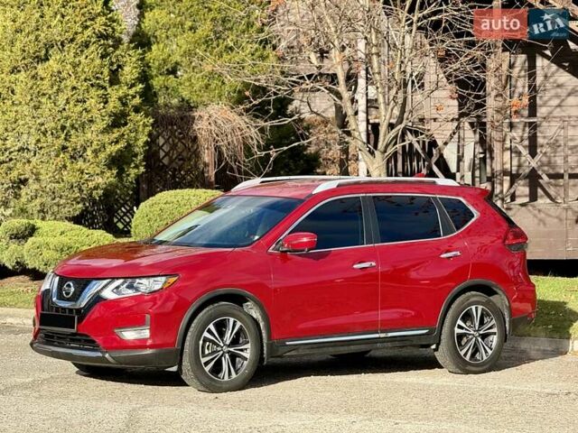 Красный Ниссан Rogue, объемом двигателя 2.5 л и пробегом 170 тыс. км за 13999 $, фото 1 на Automoto.ua