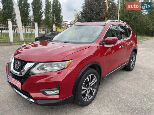 Красный Ниссан Rogue, объемом двигателя 2.5 л и пробегом 147 тыс. км за 16000 $, фото 3 на Automoto.ua