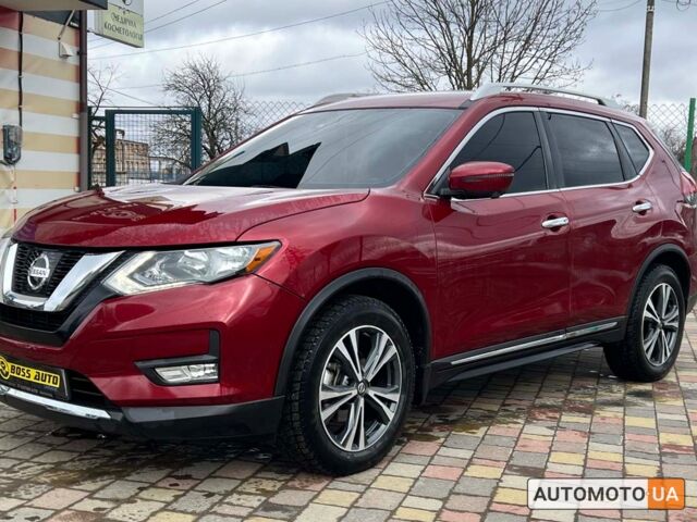 Красный Ниссан Rogue, объемом двигателя 2.5 л и пробегом 163 тыс. км за 16800 $, фото 2 на Automoto.ua