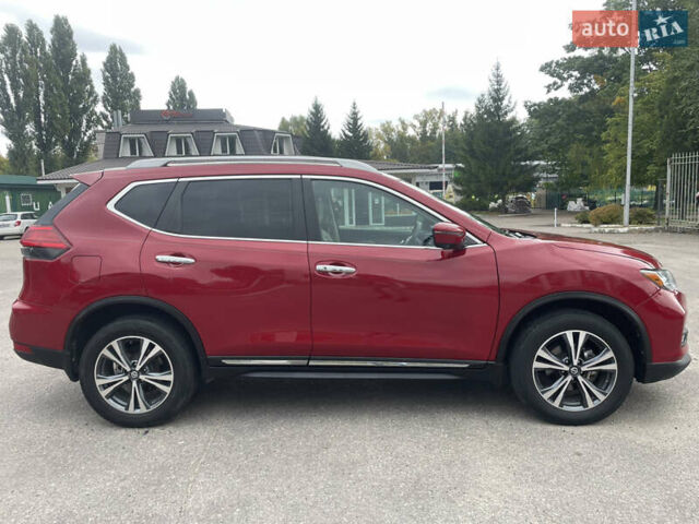 Красный Ниссан Rogue, объемом двигателя 2.5 л и пробегом 147 тыс. км за 16000 $, фото 6 на Automoto.ua