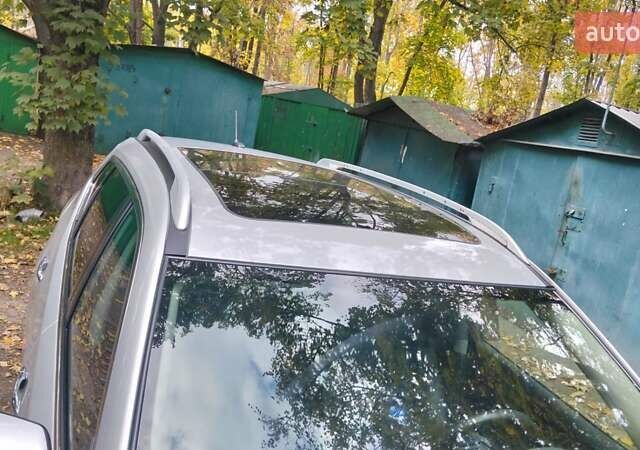 Серый Ниссан Rogue, объемом двигателя 2.5 л и пробегом 137 тыс. км за 12800 $, фото 2 на Automoto.ua