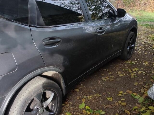 Сірий Ніссан Rogue, об'ємом двигуна 2.5 л та пробігом 209 тис. км за 12200 $, фото 9 на Automoto.ua