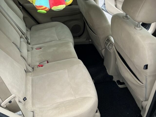 Серый Ниссан Rogue, объемом двигателя 2.5 л и пробегом 208 тыс. км за 12700 $, фото 18 на Automoto.ua