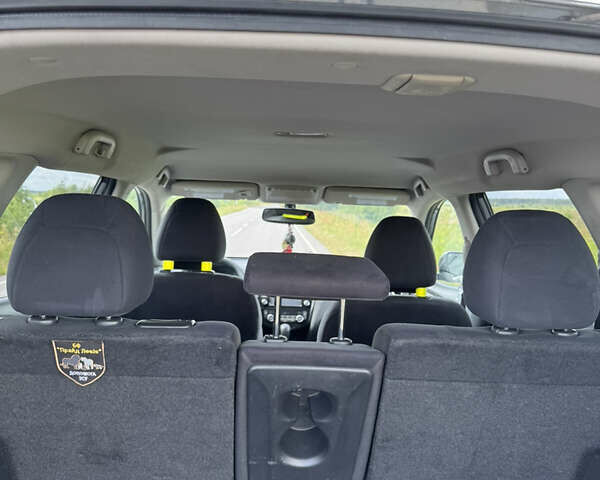 Серый Ниссан Rogue, объемом двигателя 2.49 л и пробегом 122 тыс. км за 14000 $, фото 9 на Automoto.ua