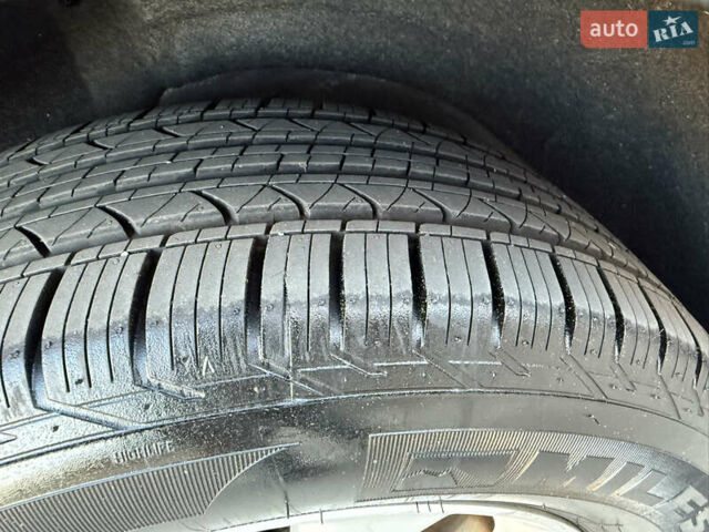 Серый Ниссан Rogue, объемом двигателя 2.49 л и пробегом 83 тыс. км за 12500 $, фото 45 на Automoto.ua