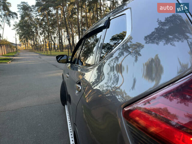 Серый Ниссан Rogue, объемом двигателя 2.5 л и пробегом 112 тыс. км за 13400 $, фото 7 на Automoto.ua