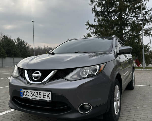 Серый Ниссан Rogue, объемом двигателя 2 л и пробегом 185 тыс. км за 14500 $, фото 1 на Automoto.ua