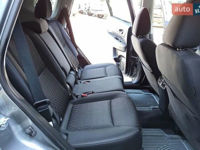 Серый Ниссан Rogue, объемом двигателя 2.5 л и пробегом 150 тыс. км за 14000 $, фото 12 на Automoto.ua